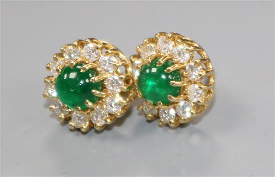A pair of 18ct gold, cabochon emerald and diamond ear studs.